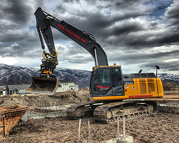 John Deere 210G excavator