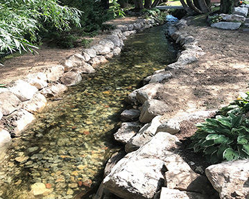 Creek with rock walls on both sides